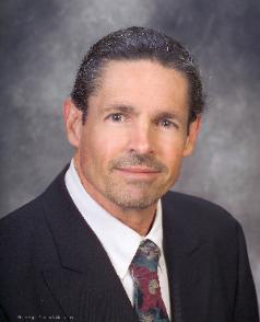 Portrait of Mark Woodlock, Esq., founder of Woodlock Construction Law Firm